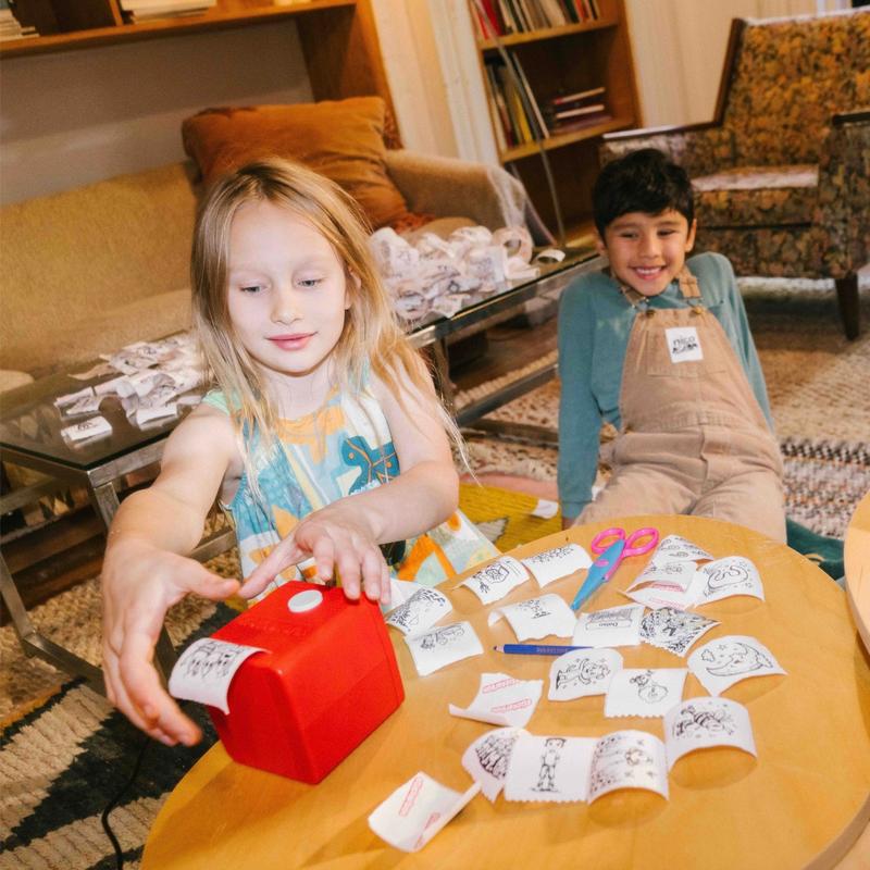 Children printing their own stickers together